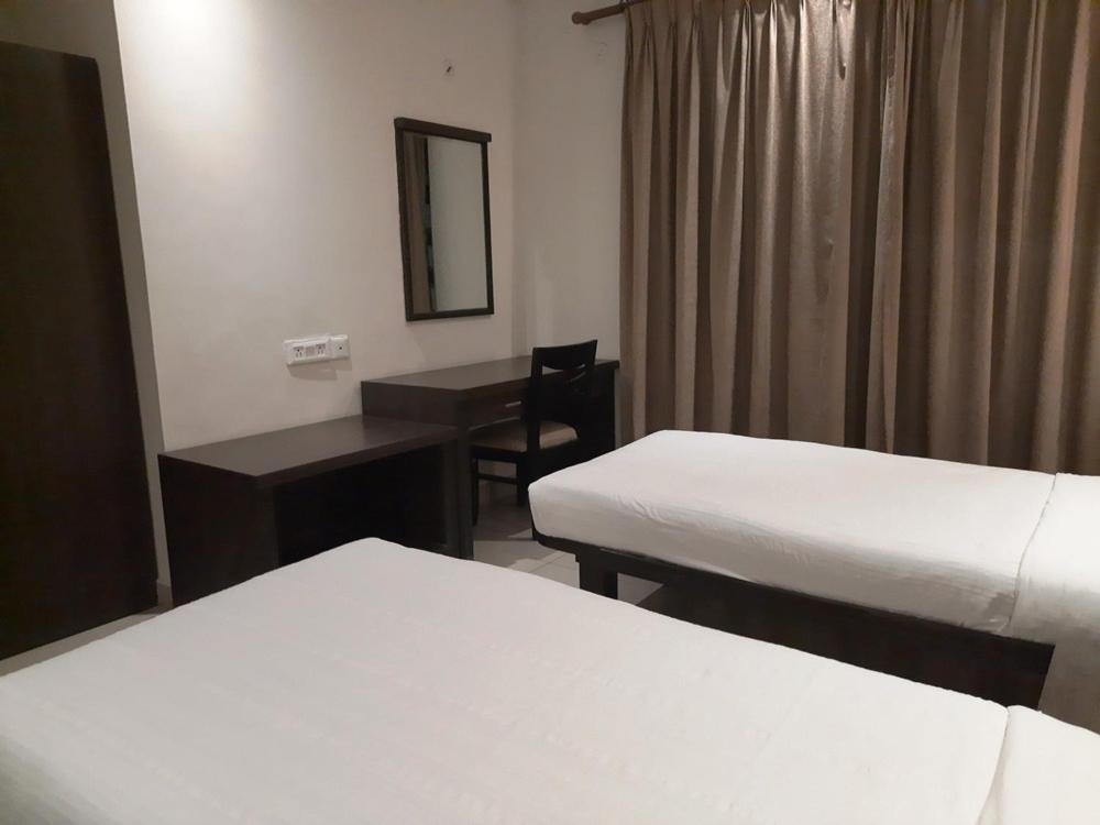 Hotel Nagarjuna Suites Бангалор Экстерьер фото